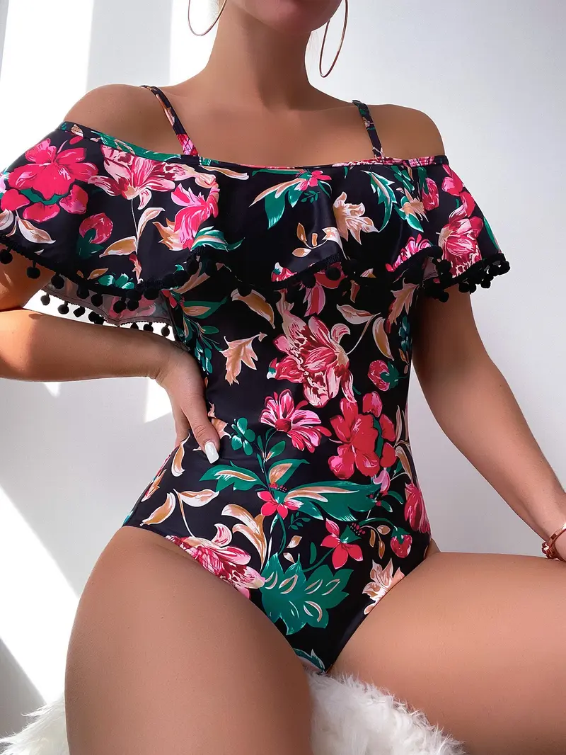 Bañador una pieza con estampado floral con diseño de pompón