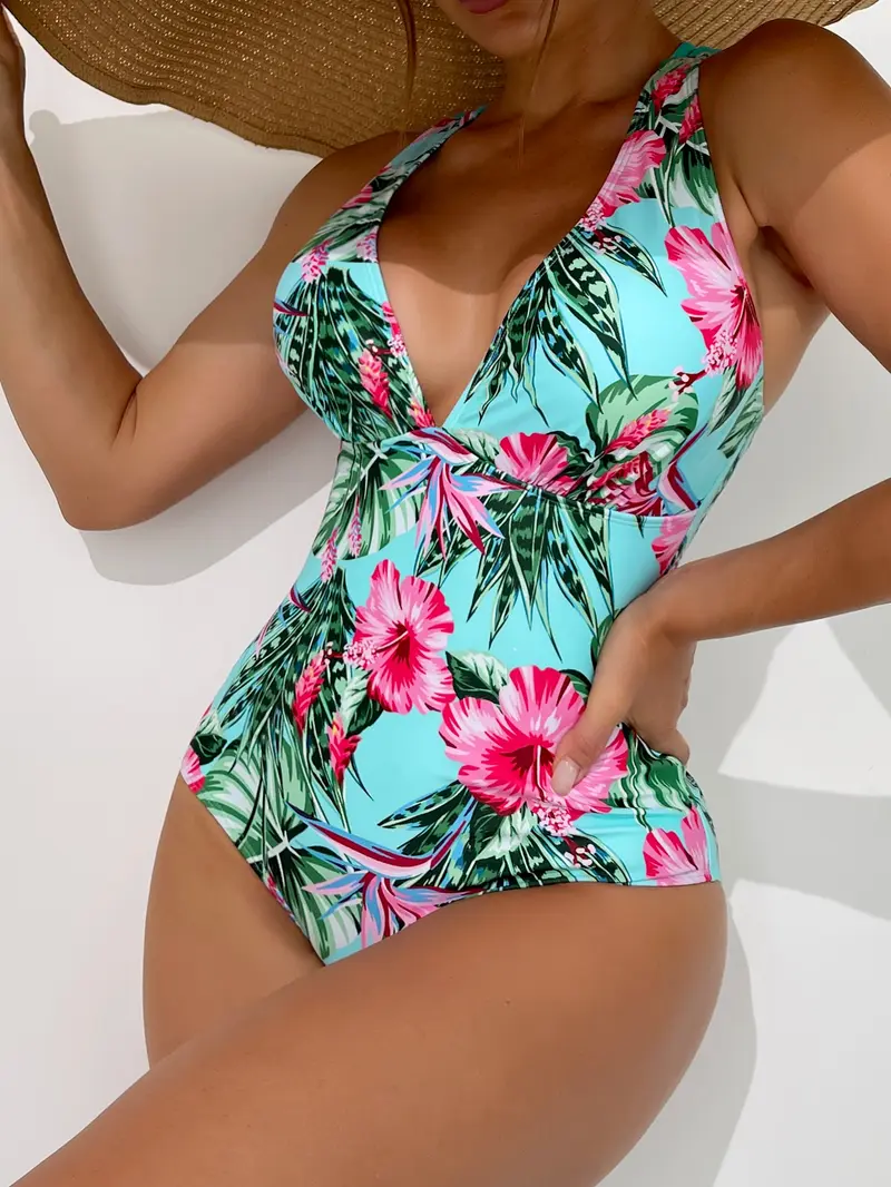 Bañador una pieza con estampado tropical con tira cruzada