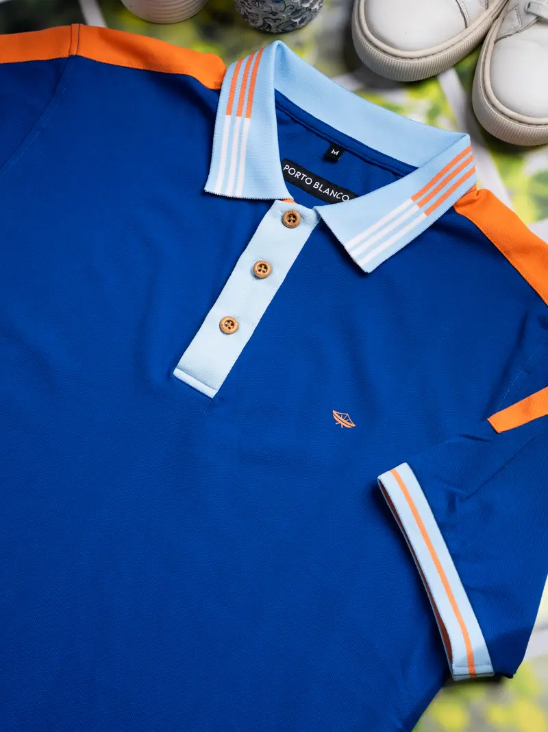 Polo Azul Porto Planco detalles de color anaranjado y blanco | PLE-2444